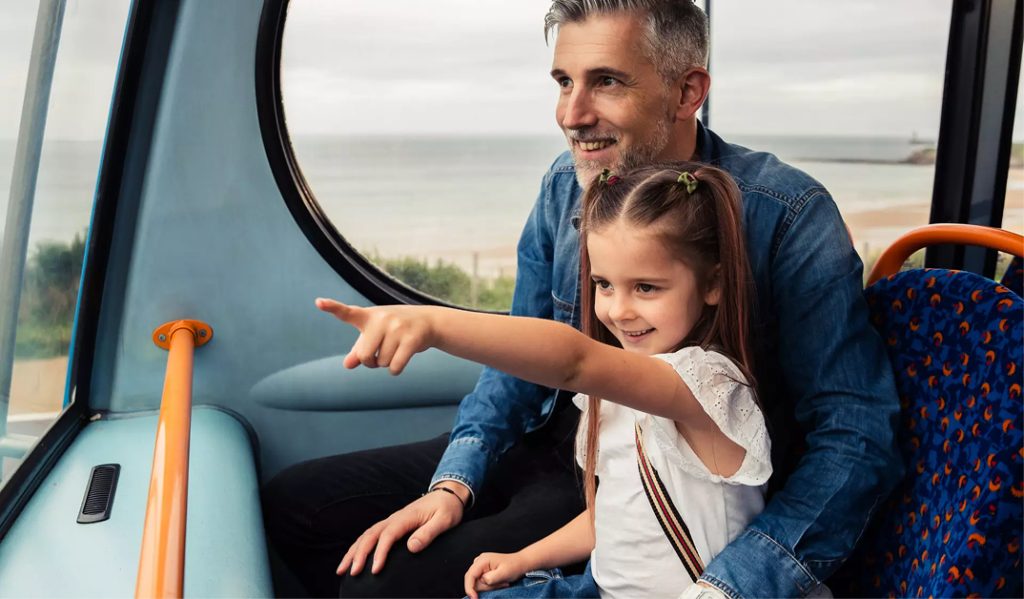 Girl pointing on bus