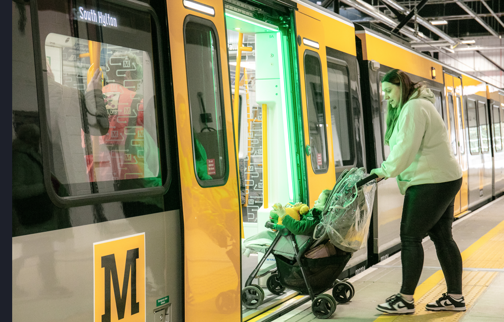 Pushchair on new Metro fleet showing sliding step